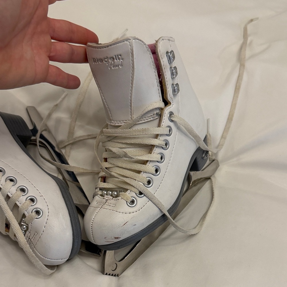 White Riedell Ice Skates with Rhinestone Accent. Freshly sharpened blades